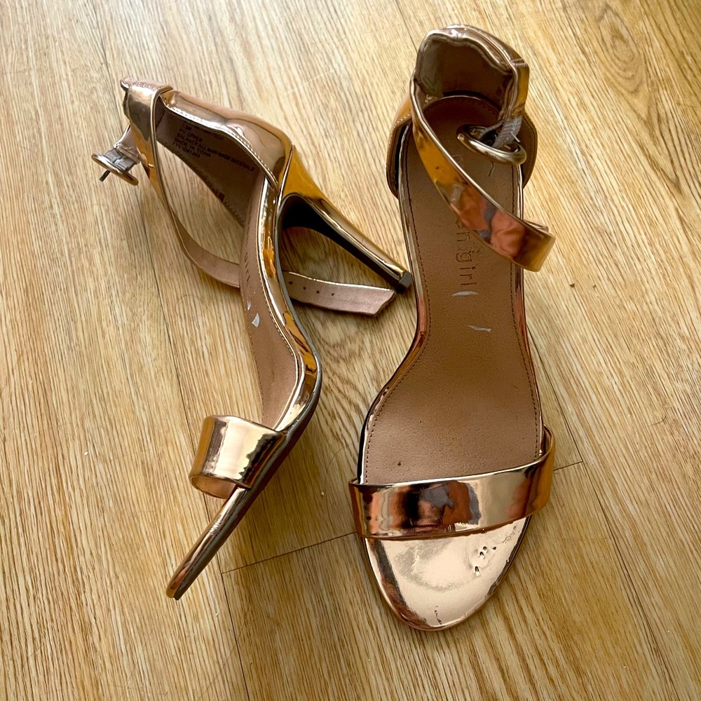 Madden Girl Heeled sandals in rose gold.